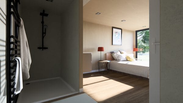 Intérieur moderne d'un module en bois avec salle de bain et chambre communicantes, mêlant fonctionnalité et esthétique contemporaine