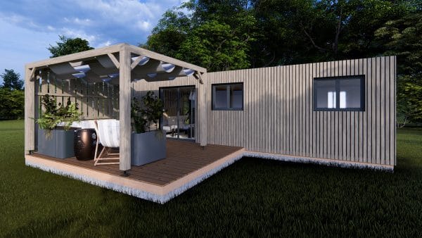 Module en bois moderne avec terrasse couverte et bardage vertical, intégré dans un environnement verdoyant.