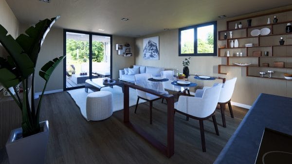Intérieur moderne et lumineux d'un module en bois avec salon et salle à manger ouverts donnant sur une terrasse extérieure.