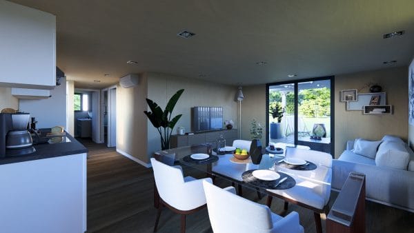 Intérieur moderne d'un module en bois avec espace de vie ouvert comprenant cuisine, salle à manger et salon, baigné de lumière naturelle