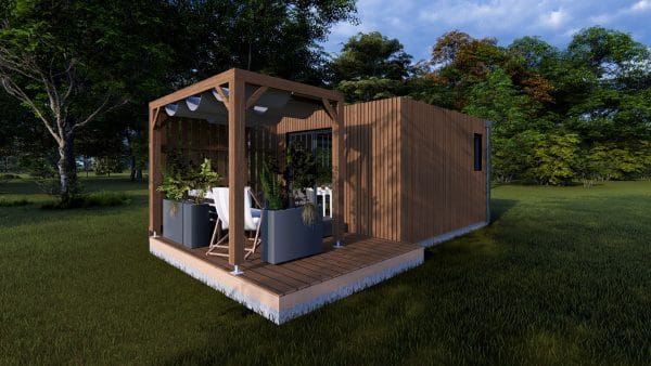 Module en bois moderne "Le Nest" avec terrasse couverte et espace détente en pleine nature.