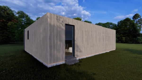 Module en bois contemporain "L'Escapade" de 47,3 m² avec bardage vertical gris, posé dans un environnement naturel verdoyant.