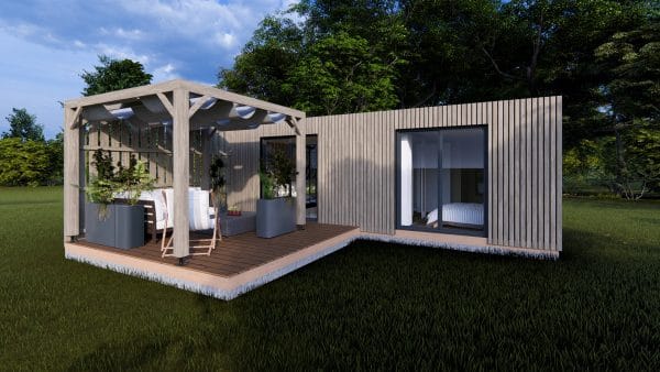 Module en bois moderne "L'Escapade" avec terrasse couverte et pergola, disposé dans un cadre verdoyant.