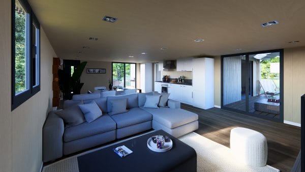 Intérieur moderne d'un module en bois avec espace de vie lumineux et cuisine ouverte.