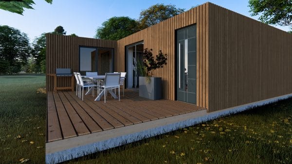 Module en bois contemporain avec terrasse aménagée dans un cadre naturel verdoyant.