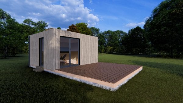 Module en bois moderne avec terrasse, situé dans un environnement naturel verdoyant.