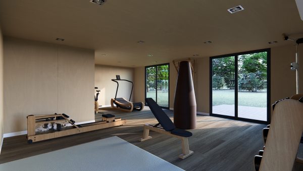 Salle de sport moderne et lumineuse aménagée dans un module en bois, équipée de matériel design et écologique, avec vue sur un jardin verdoyant grâce à de grandes baies vitrées.