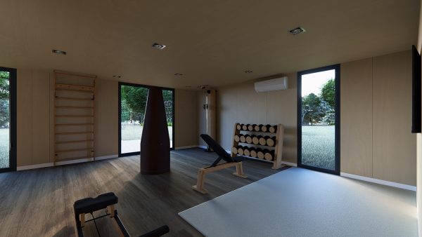 Salle de sport lumineuse et moderne aménagée dans un module en bois, équipée d’appareils de fitness en bois et d’un espace de détente.